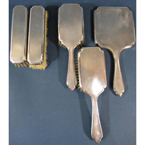 221 - A five piece engine turned silver brush and mirror set