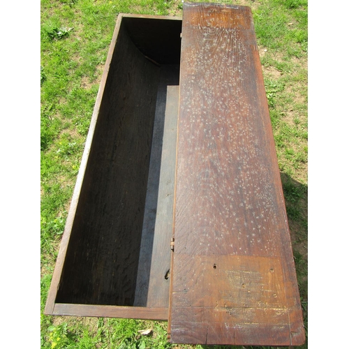 1219 - An 18th century oak dough bin with hinged lid, raised/cradled on a stand with turned supports united... 