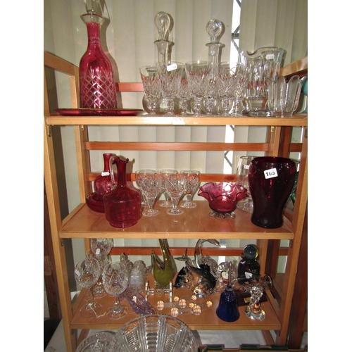 124 - A large quantity of glass items, ranging from glass animals, Cinderella’s slipper, drinking glasses,... 