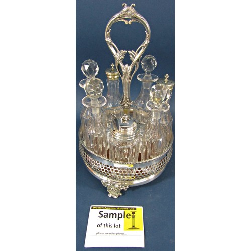 123 - A silver  plated  Georgian style vinaigrette stand with pierced sides and a central scrolled handle ... 