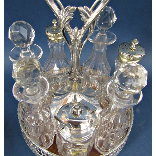 123 - A silver  plated  Georgian style vinaigrette stand with pierced sides and a central scrolled handle ... 