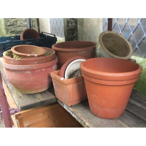 1017 - Approximately 50 plus terracotta flower pots and planters of varying design and size, (some af)