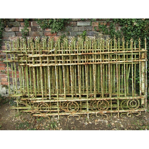 1032 - Eight sections of 19th century wrought iron railing with vertical cylindrical solid bars with pierce... 