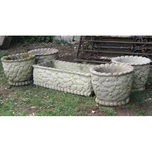 1033 - Four cast composition stone circular garden planters with acorn and oak leaf detail, 35 cm diameter ... 