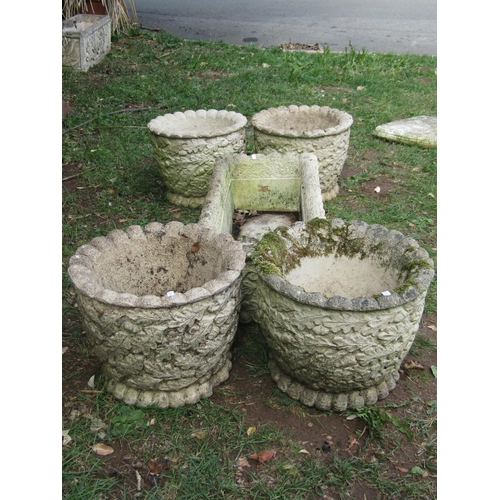 1033 - Four cast composition stone circular garden planters with acorn and oak leaf detail, 35 cm diameter ... 