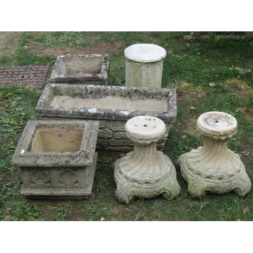 1053 - Three weathered cast composition stone planters of various size and design, one with gothic quatrefo... 