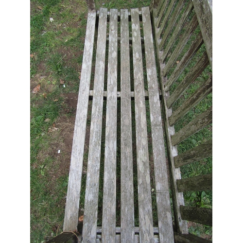 1055 - A Barlow Tyrie weathered teak garden bench with slatted seat and back 160 cm wide