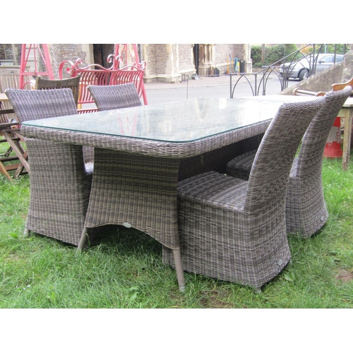 1056 - A Bramblecrest rattan garden terrace table of rectangular form with rounded corners and plate glass ... 