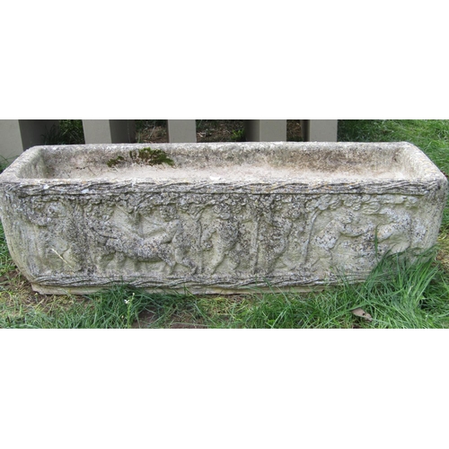 1060 - A weathered cast composition stone flower trough of rectangular form with repeating harvesting cheru... 