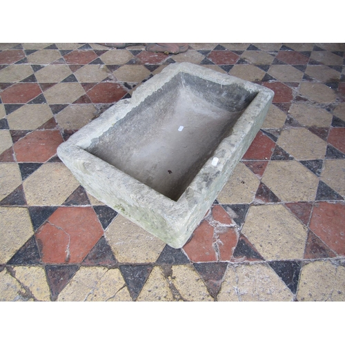 1071 - A small shallow natural stone trough of rectangular form, 54 cm long x 36 cm wide x 15 cm deep