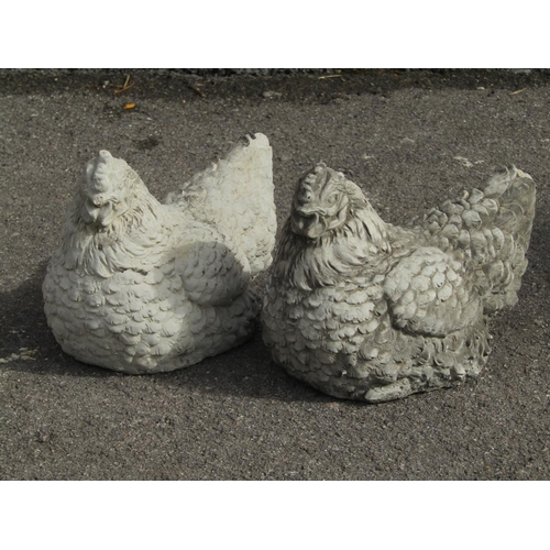 1093 - Two cast composition stone garden ornaments in the form of nesting/roosting hens with well detailed ... 