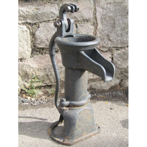 1096 - A cast iron hand lever operated water pump, 50cm high