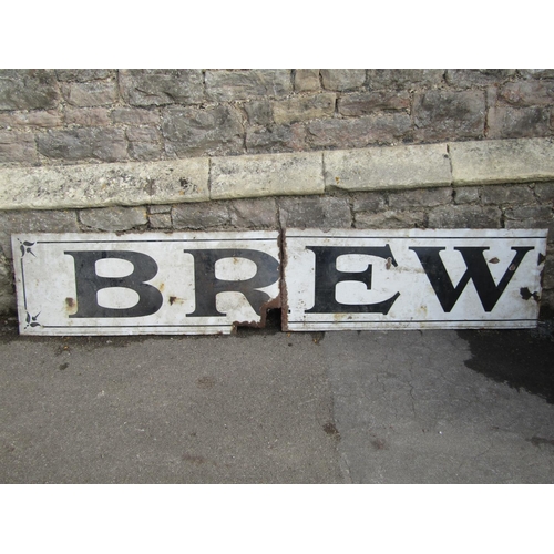 1098 - A vintage enamel sign of rectangular form in two sections, cream ground with black lettering 'Brew',... 