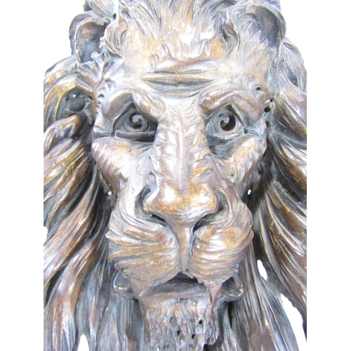 651 - A 19th century carved wooden mask of a lion’s head and mane 40cm x 30cm approx