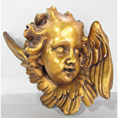 653 - An Angel’s face, terracotta with a gold finish.