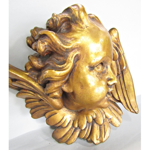 653 - An Angel’s face, terracotta with a gold finish.