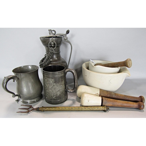 659 - Kitchenalia consisting of an enamel bread bin, a table top mince press, pestles and mortars, weighin... 