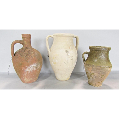 665 - An earthenware flagon, a double handled vase, and a partially glazed earthenware vase.