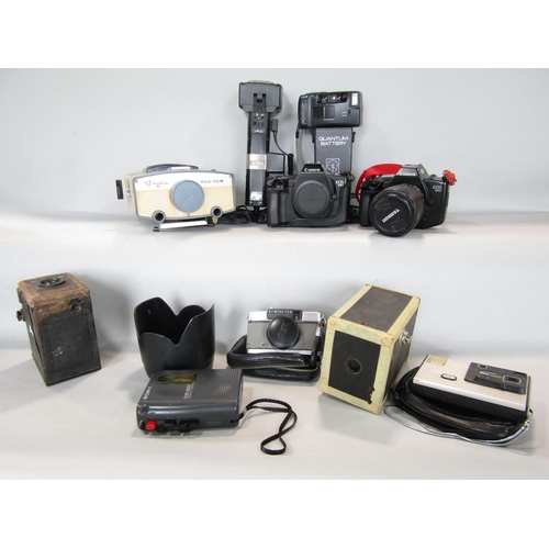 669 - Photographic equipment including two Canon EOS 650 both with Tamron zoom lens, a flash gun, a vintag... 