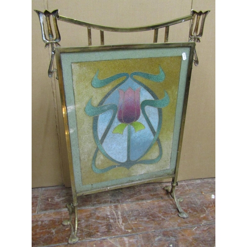 1622 - An art nouveau firescreen in brass, the stylistic frame enclosing a glass bead work panel with centr... 