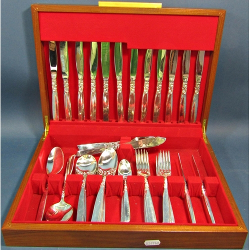 194 - Two silver napkin rings, a set of six silver handled butter knives with case, a silver handled glove... 