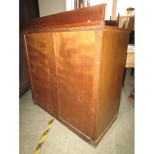 1296 - An Edwardian satinwood veneered shallow bow fronted side cupboard floorstanding and enclosed by a pa... 