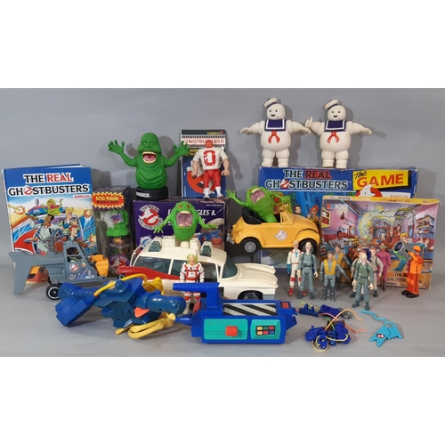 563 - A collection of GHOSTBUSTERS toys, games and figures mostly 1980's  including Ecto 1, 'Highway Haunt... 