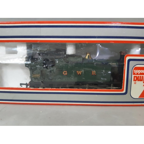 560 - 00 gauge boxed railway models by Lima comprising 2 GWR Prairie Tank locomotives, coaches and rolling... 