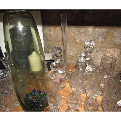 146A - A quantity of 20th century cut glass champagne flutes, wine glasses, and some Waterford and Dartingt... 