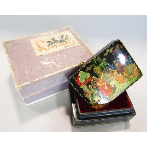 823 - A papier-mâché lacquered box made in the USSR, signed and dated 1969, in its original box, 6cm wide,... 