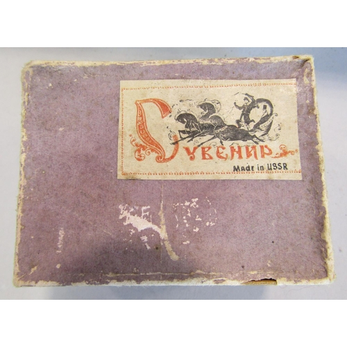 823 - A papier-mâché lacquered box made in the USSR, signed and dated 1969, in its original box, 6cm wide,... 