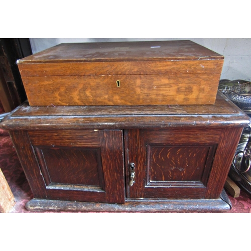 157 - An early 20th century oak canteen with later stainless steel flatware and another  oak canteen of el... 