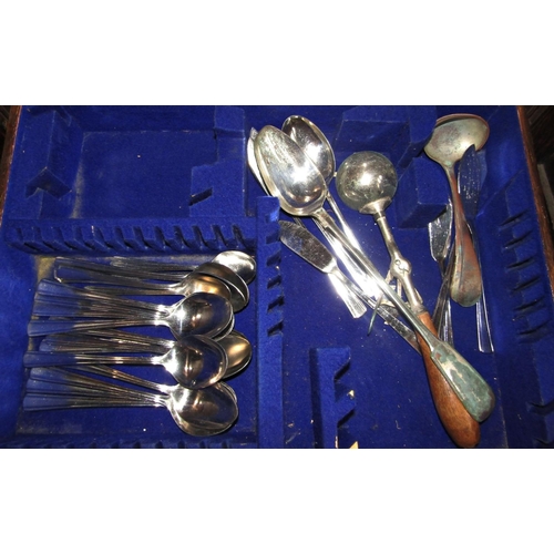 157 - An early 20th century oak canteen with later stainless steel flatware and another  oak canteen of el... 