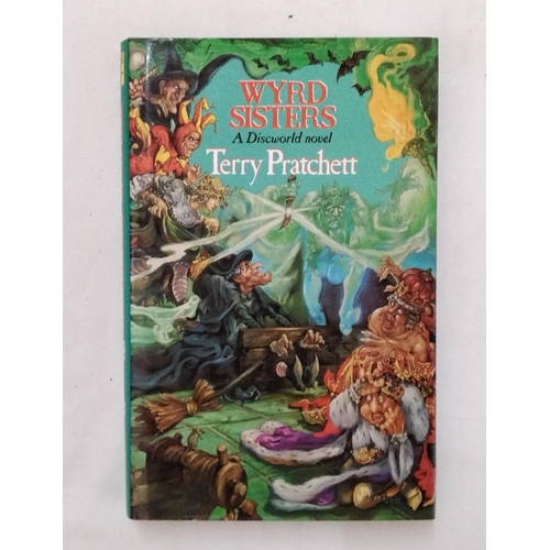 1698 - Pratchett, Terry - Wyrd Sisters, first edition 1988 and signed by the author (1) (displayed in cabin... 