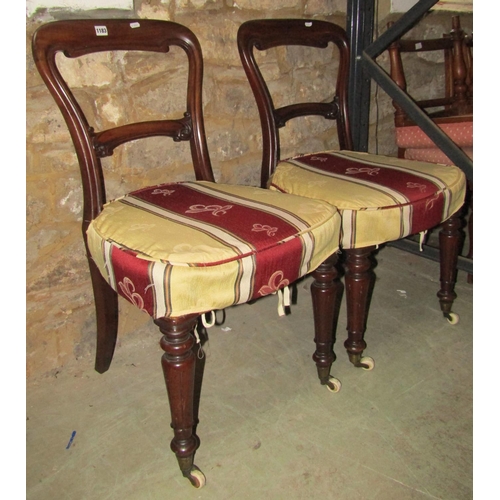 1183 - Four Victorian mahogany balloon back dining chairs with moulded frames, scrolled bar splats, upholst... 