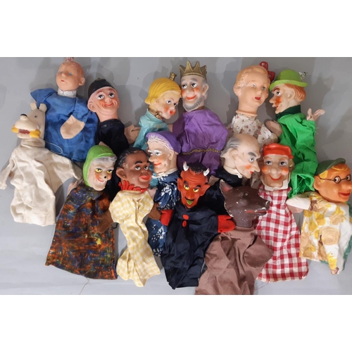 589 - Vintage wooden puppet theatre together with a collection of Tintin themed hand puppets. Theatre  hei... 