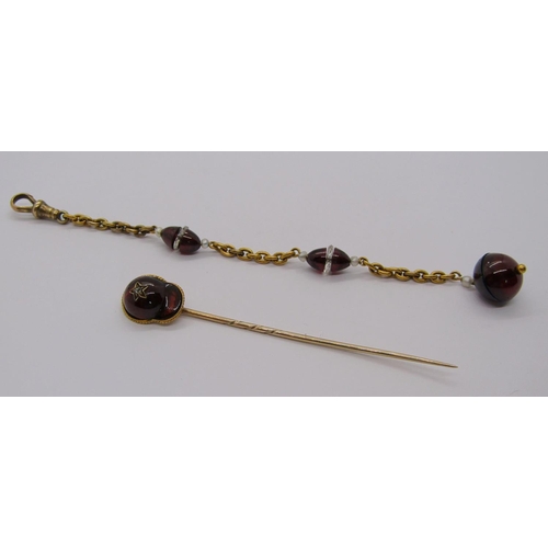 265 - Antique 15ct chain fob with garnet and baroque pearl beads, together with a yellow metal stick pin s... 