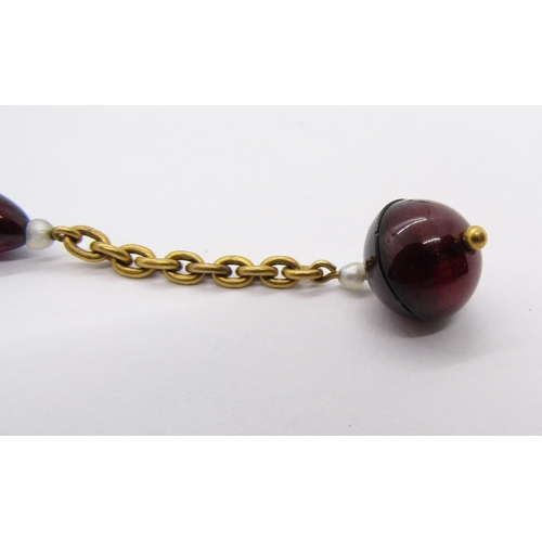 265 - Antique 15ct chain fob with garnet and baroque pearl beads, together with a yellow metal stick pin s... 