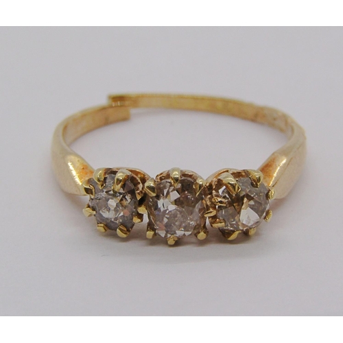 278 - 18ct three stone old-cut diamond ring, 2.4g (shank cut) and a Victorian gilt metal locket with engra... 