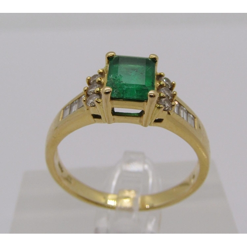 299 - 18ct vari-cut emerald and diamond ring, size S, 4.9g, with accompanying 2004 Kirk Freeport insurance... 