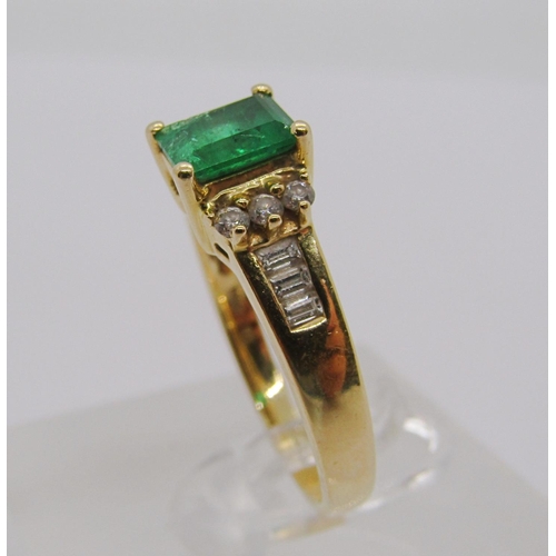 299 - 18ct vari-cut emerald and diamond ring, size S, 4.9g, with accompanying 2004 Kirk Freeport insurance... 