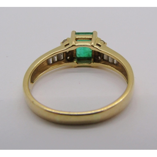 299 - 18ct vari-cut emerald and diamond ring, size S, 4.9g, with accompanying 2004 Kirk Freeport insurance... 