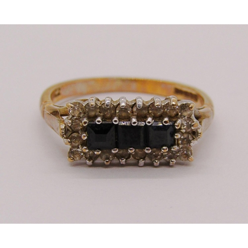 306 - 9ct black and white diamond crossover type ring, size L/M and a further 9ct cubic zirconia example, ... 