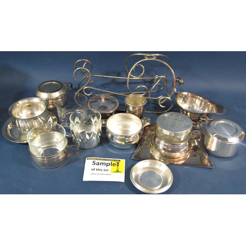 170 - A mixed selection of silver plated items including a sauce boat, dishes bowls , bottle rest, candle ... 