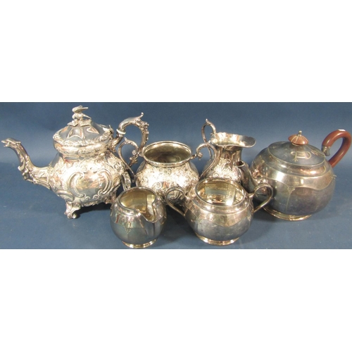 172 - A good quality elaborate Britannia metal three piece tea service teapot with an eagle head grotesque... 