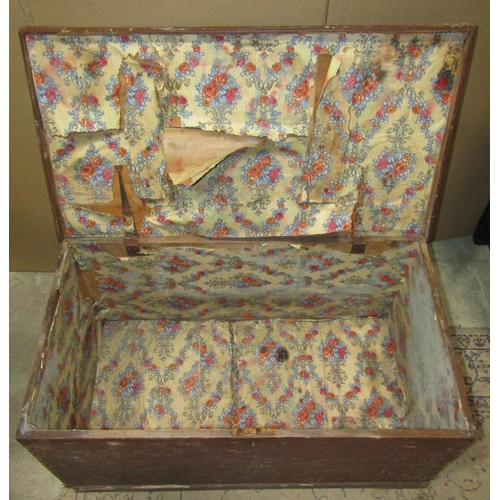 1175 - A 19th century stained pine blanket box with hinged lid and side drop carrying handles, (af)