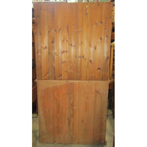 1231 - A reclaimed stripped pine cottage dresser, the base enclosed by a pair of rectangular panelled doors... 