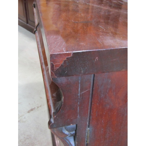 1265 - A Victorian mahogany chiffonier enclosed by a pair of arched panelled doors beneath two frieze drawe... 