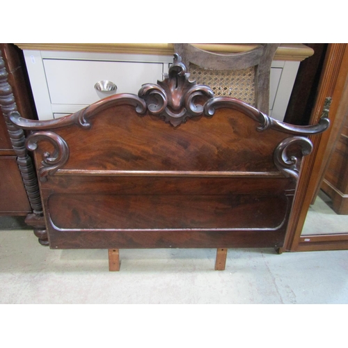 1265 - A Victorian mahogany chiffonier enclosed by a pair of arched panelled doors beneath two frieze drawe... 