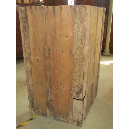 1285 - A 19th century stripped pine countrymade hanging corner cupboard enclosed by a pair of rectangular m... 